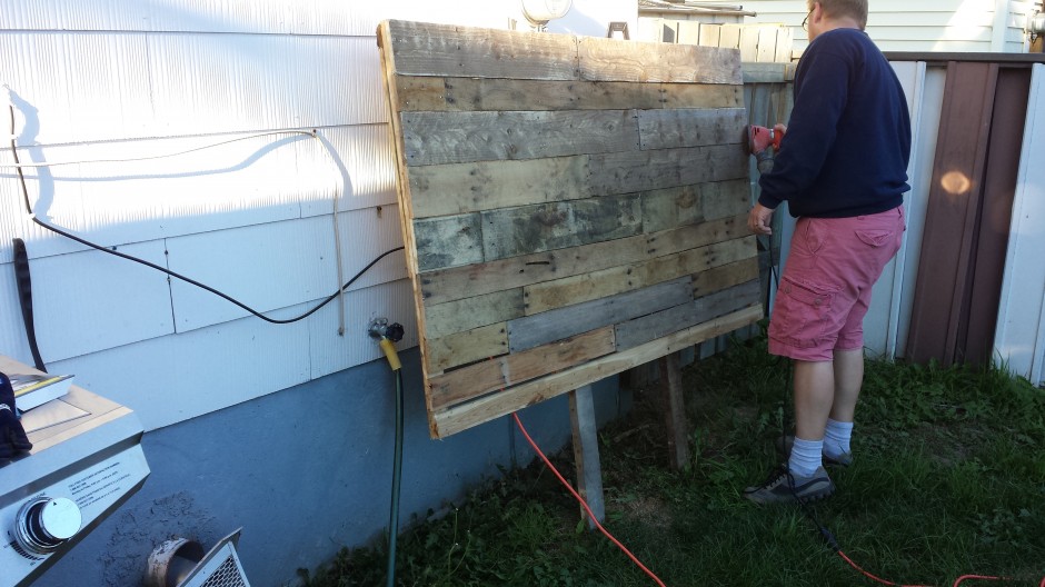 Things are starting to take shape! Sanding 'er down to avoid slivers.